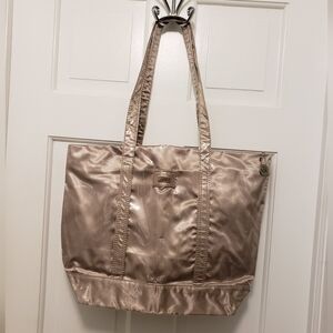 The SAK Goldtone Vinyl Shoppers Tote, Zip Close